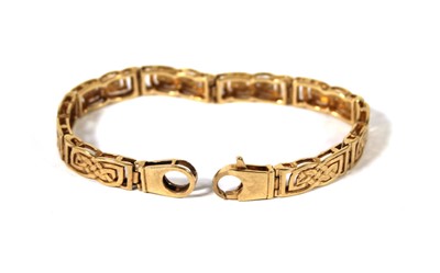 Lot 496 - A 9ct gold bracelet with openwork Celtic...