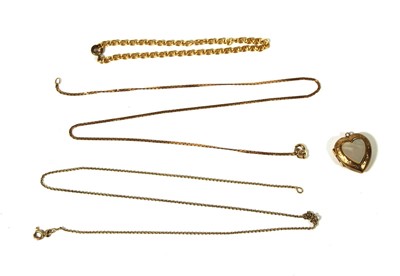 Lot 497 - Two 9ct gold chains together with a yellow...