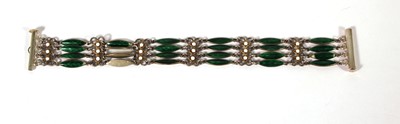 Lot 513 - A white metal and enamel four-bar bracelet in...