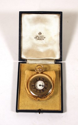Lot 521 - A 9ct gold half hunter pocket watch, the dial...