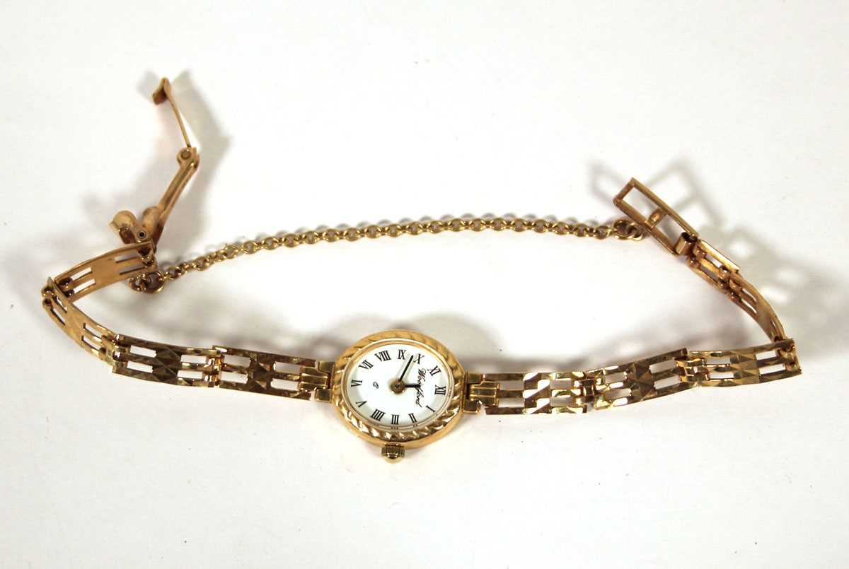Lot 528 - A ladies 9ct gold Woodford wristwatch. Approx....