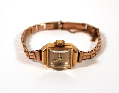 Lot 539 - A ladies yellow metal cased wristwatch, the...