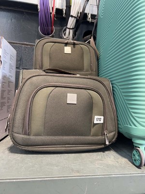 Lot 1712 - Tripp dark green hand luggage and vanity case set