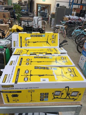 Lot 2511 - 4 boxed Wessex tripod 2 x 50 watt worklights...