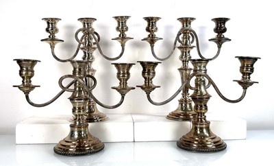 Lot 352 - A pair of silver plated three branch...