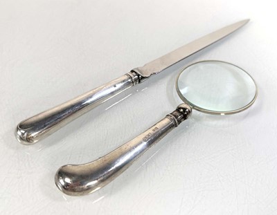 Lot 361 - A silver handled magnifying glass with pistol...