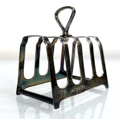 Lot 363 - A silver four slice toast rack, maker C&R,...