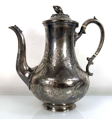 Lot 373 - A Victorian silver coffee pot of bulbous form...