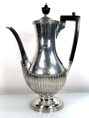 Lot 374 - An Edwardian silver coffee pot of bulbous form...