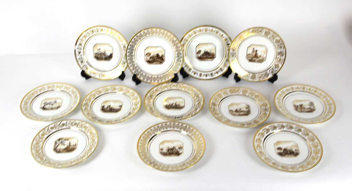 Lot 203 - A set of twelve Sevres porcelain cabinet...