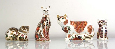 Lot 254 - Four Royal Crown Derby paperweights, each...