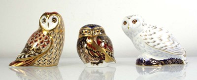 Lot 255 - Three Royal Crown Derby paperweights, each...