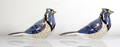 Lot 259 - A pair of Royal Crown Derby paperweights, each...