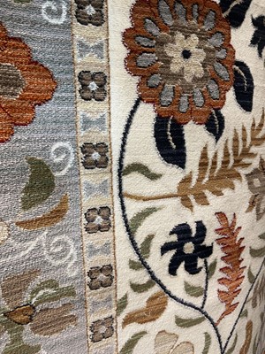Lot 5002 - Carpet with multicoloured floral pattern