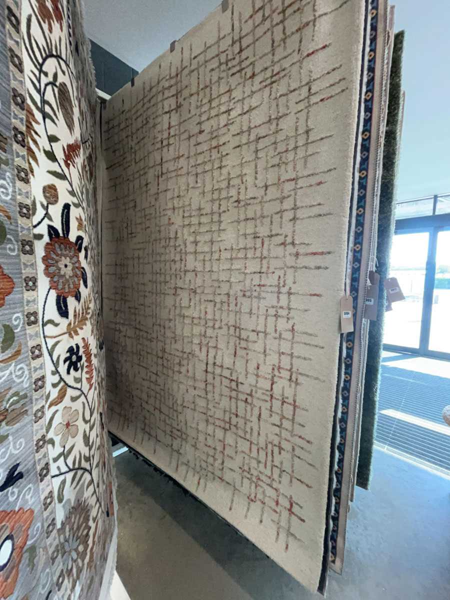 Lot 5003 - Carpet with beige background and geometric...