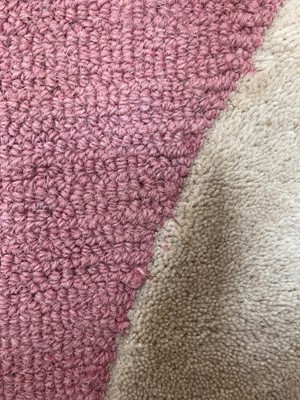Lot 5028 - Multicoloured carpet with geometric pattern