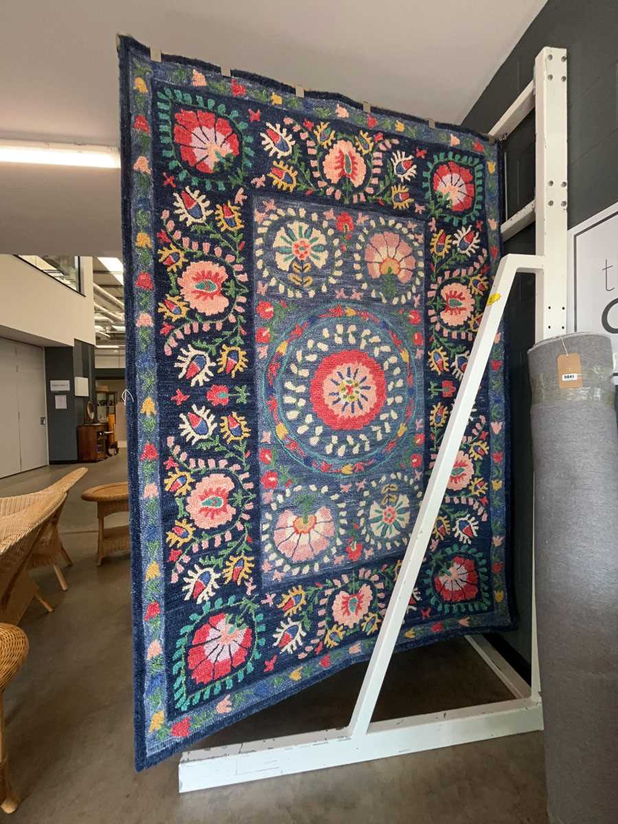 Lot 5040 - Multicoloured floral carpet with blue background