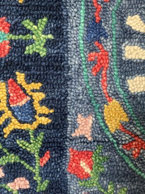 Lot 5040 - Multicoloured floral carpet with blue background