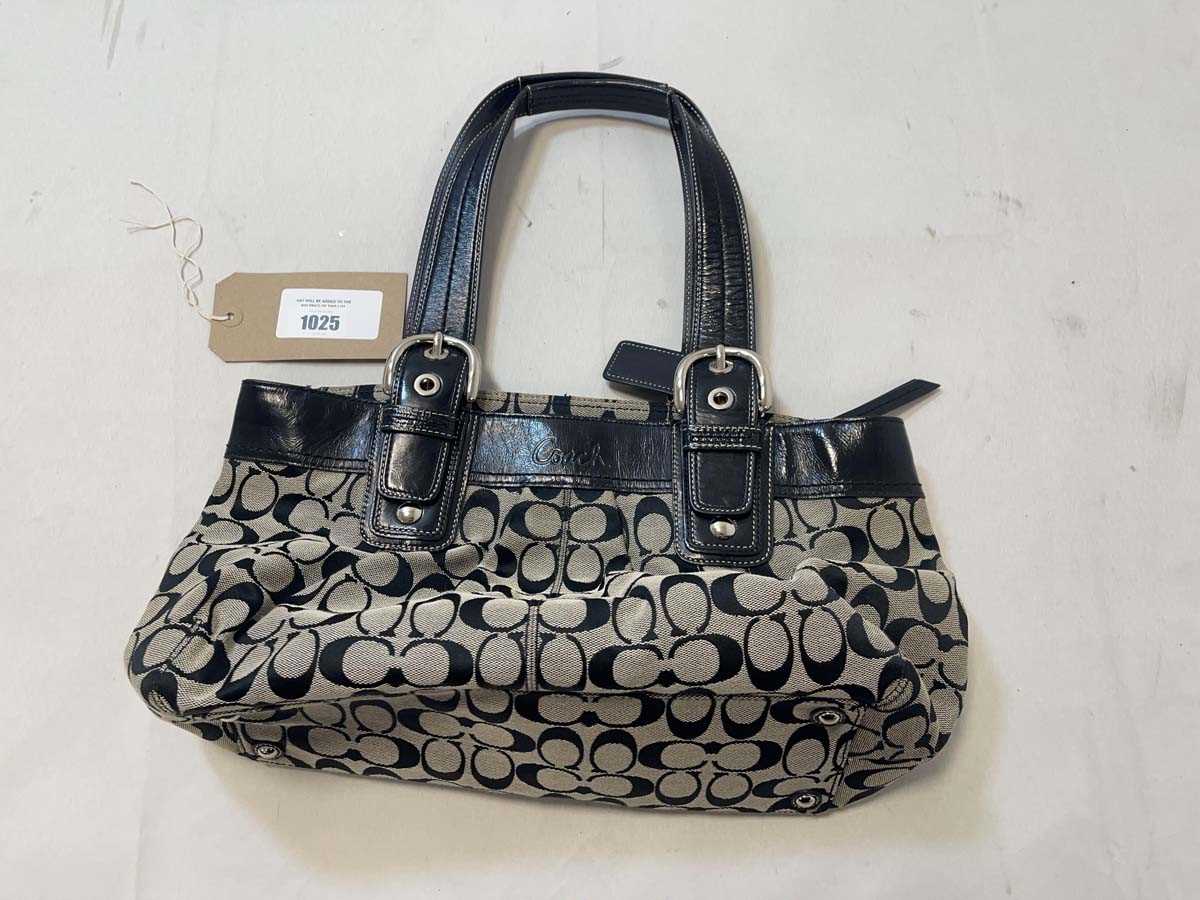 Lot 1025 - Vintage Coach logo print handbag in black