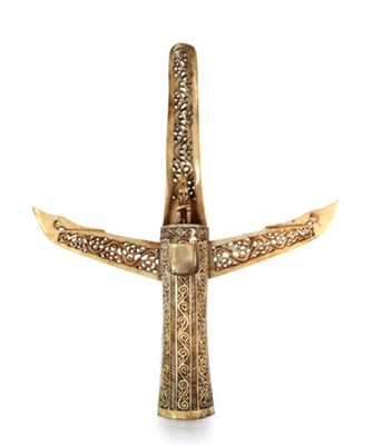 Lot 99 - A worked cow-horn modelled as a candle holder...
