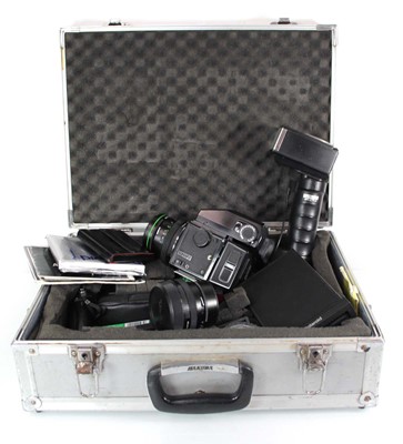 Lot 102 - A Bronica Zenza AE-II ETRS camera, cased...