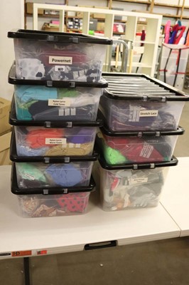 Lot 8 plastic storage boxes containing a large...