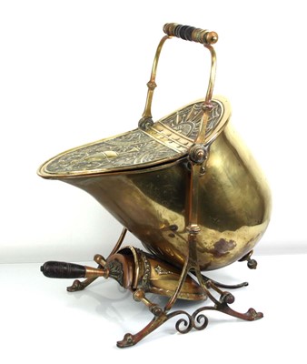 Lot 3 - A brass coal scuttle relief decorated with a...