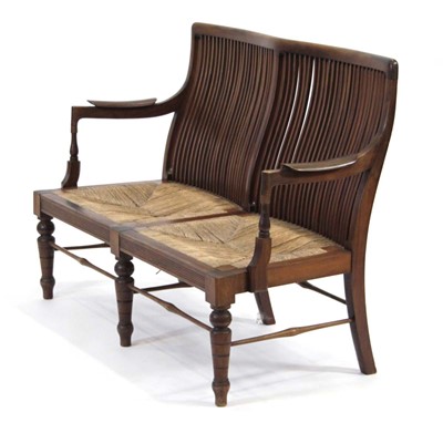 Lot 5 - A 20th century mahogany slat back two-seater...