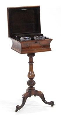 Lot 6 - A mid-19th century rosewood teapoy, the lid...