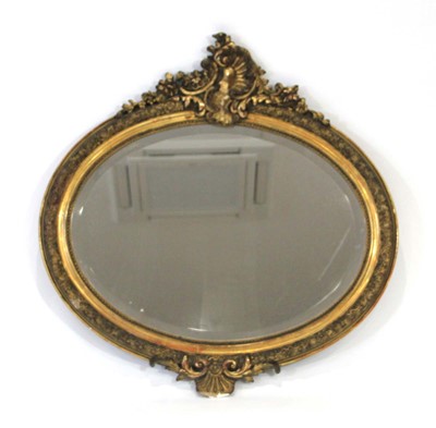 Lot 8 - A late 19th century wall mirror, the bevelled...