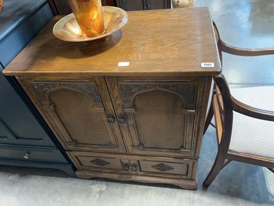 Lot 1362 - Dark oak cabinet with lower drawer