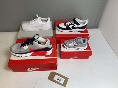 Lot 4x Boxed pairs of Nike children's shoes sizes...