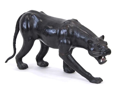 Lot 22 - A large leather figure modelled as a panther,...
