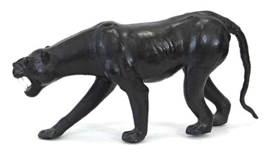 Lot 22 - A large leather figure modelled as a panther,...