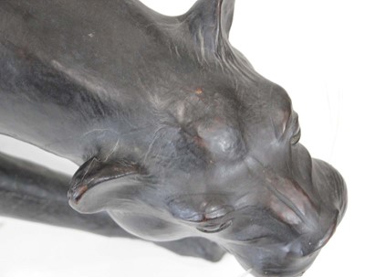 Lot 22 - A large leather figure modelled as a panther,...