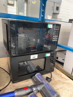 Lot 2122 - 2 Panasonic digital microwave ovens, both in...