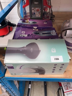 Lot 2186 - 2 boxed Philips electric steam irons together...