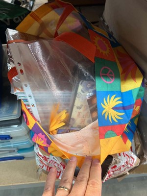 Lot 1514 - Box of plastic bags and a bag of colouring books