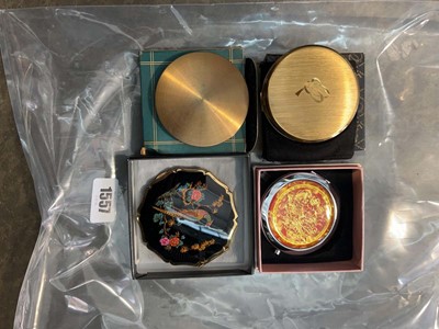 Lot 1557 - 4 boxed decorative compacts (in cage)