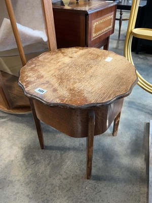 Lot 1401 - Low sewing table with lift up table top