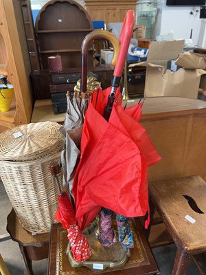 Lot 1404 - Brass umbrella stand with contents