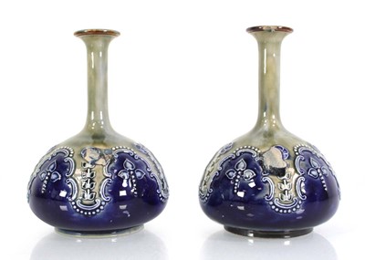 Lot 285 - A pair of Royal Doulton bottle vases,...