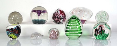 Lot 289 - Ten paperweights of varying styles and designs...
