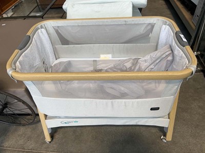 Lot 1435 - Tutti Bambini light grey fabric crib
