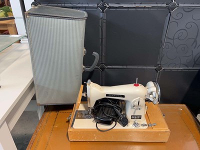 Lot 1490 - Electric operated Sew-Tric sewing machine in...