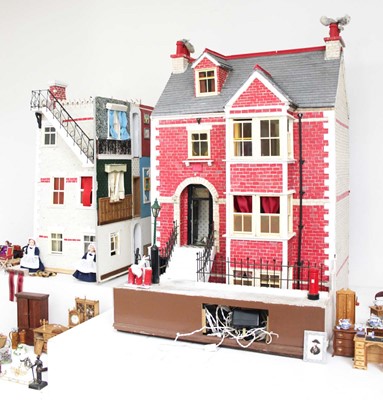 Lot 162 - A four storey dolls house modelled as a...