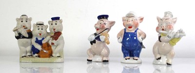Lot 170 - Disneyana: A set of three toothbrush holders,...