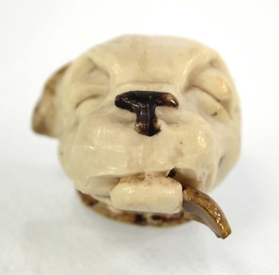 Lot 175 - Bonzo the Dog: A celluloid tape measure, l. 5 cm