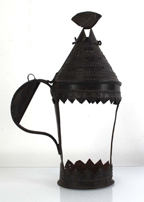 Lot 112 - A Middle Eastern pressed metal lantern, h....