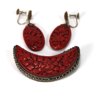 Lot 501 - A cinnabar lacquer brooch of crescent moon...